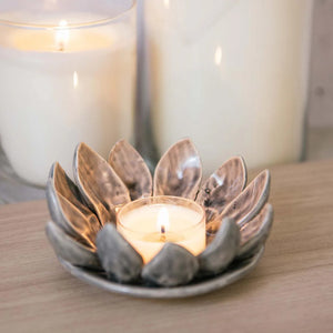 Natura Soy Tealight lit up in floral candle holder
