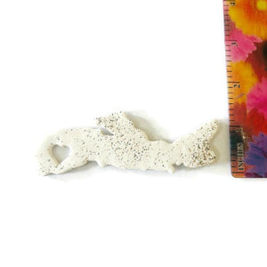 Nova Scotia fridge magnet with ruler showing size