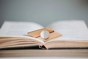 Woodswoman Wooden Page Holder on book