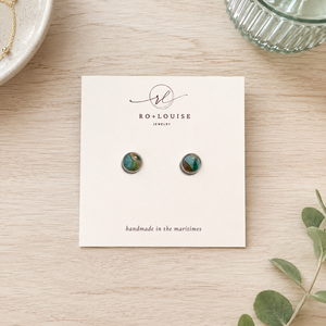 Ro + Louise Ontario inspired stud earrings on table