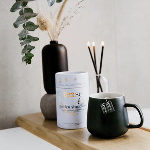 Golden Slumbers Tease tea in black mug